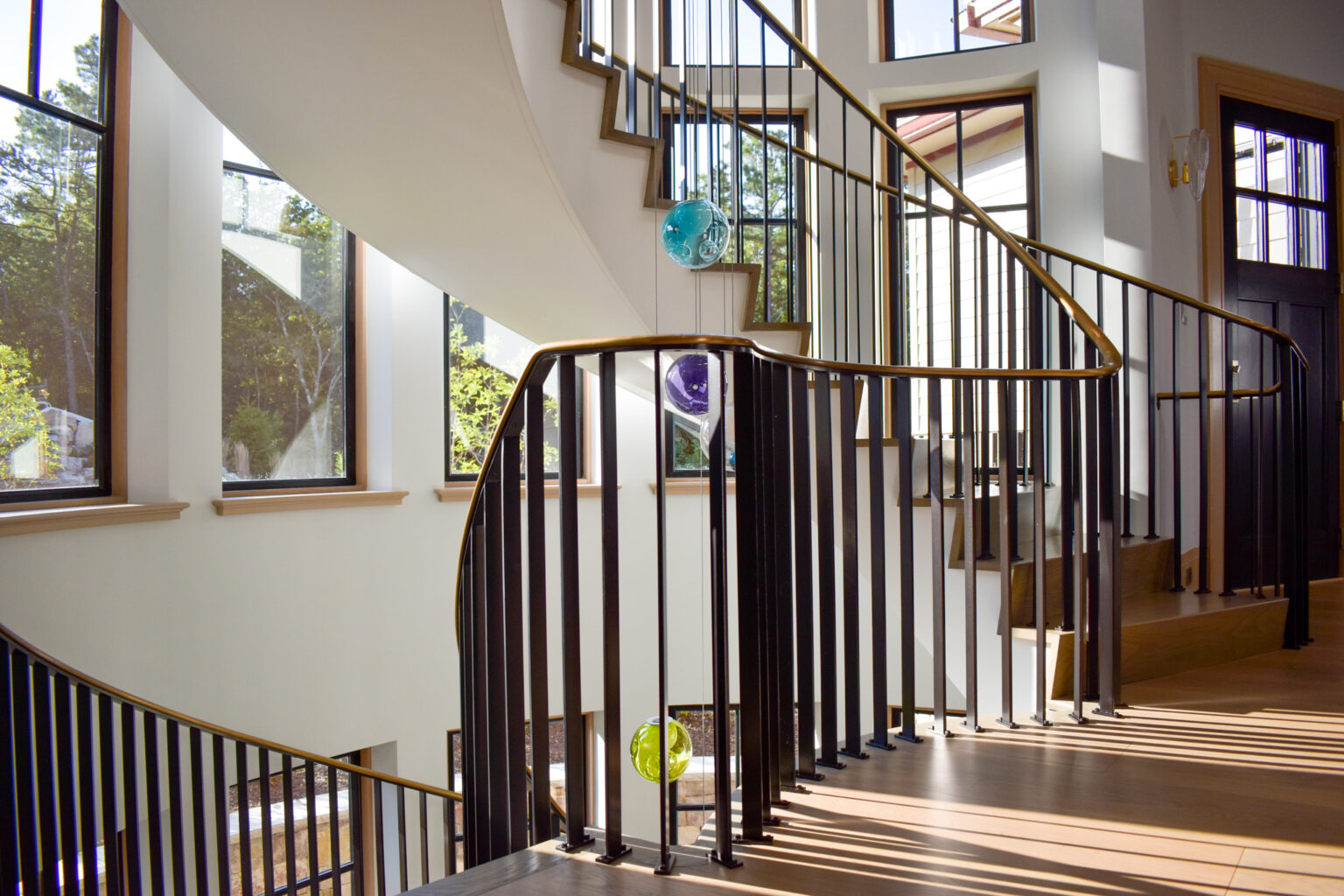 Modern Curved Stair Railing - Compass Ironworks