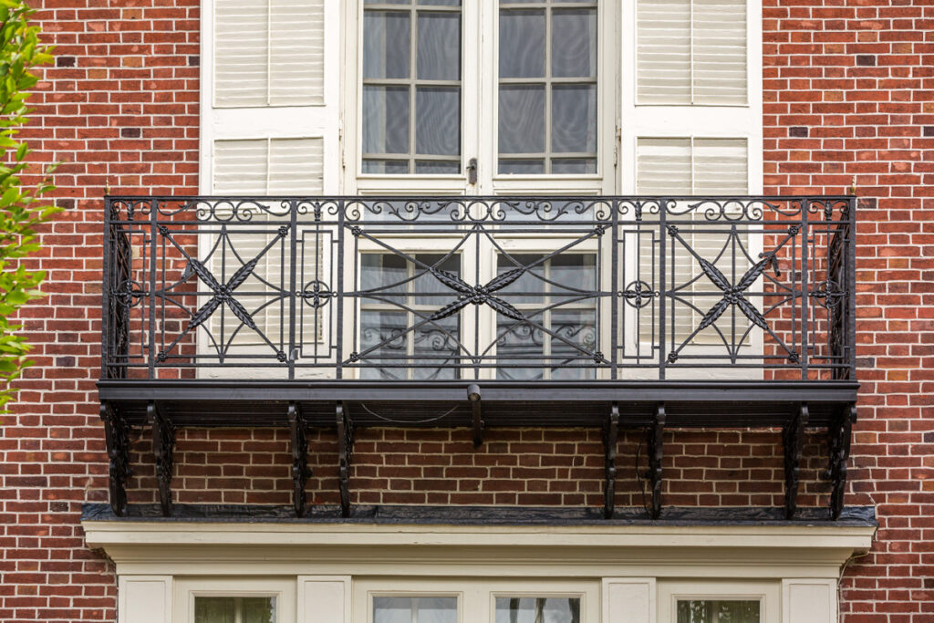 Faithful reproduction of a Samuel Yellin balcony railing, showcasing historical accuracy and artistic detail
