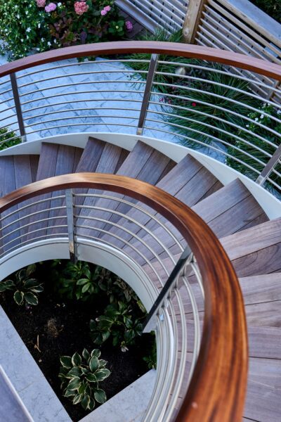 Custom Helical Staircase with Wood Caprail