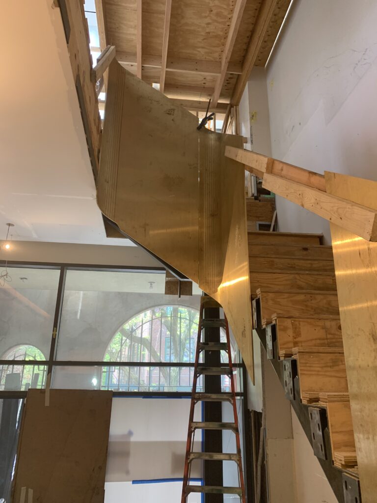Modern Brass Railing installation