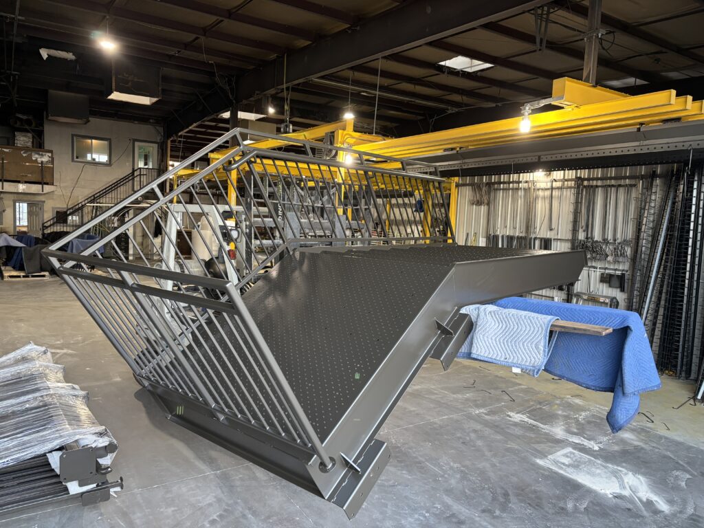 Industrial metal staircase powder coated dark gray.