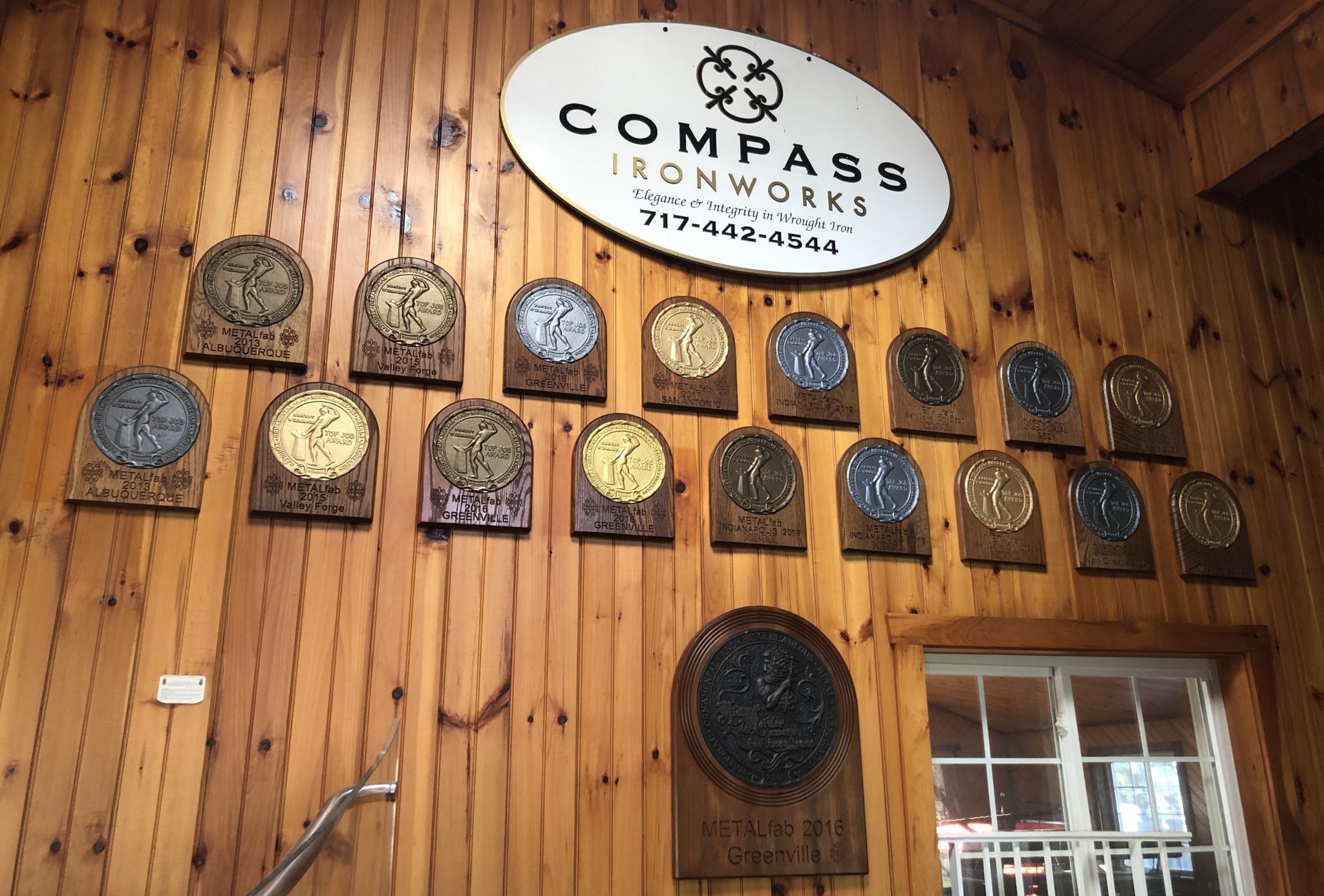 Compass Awards Wall