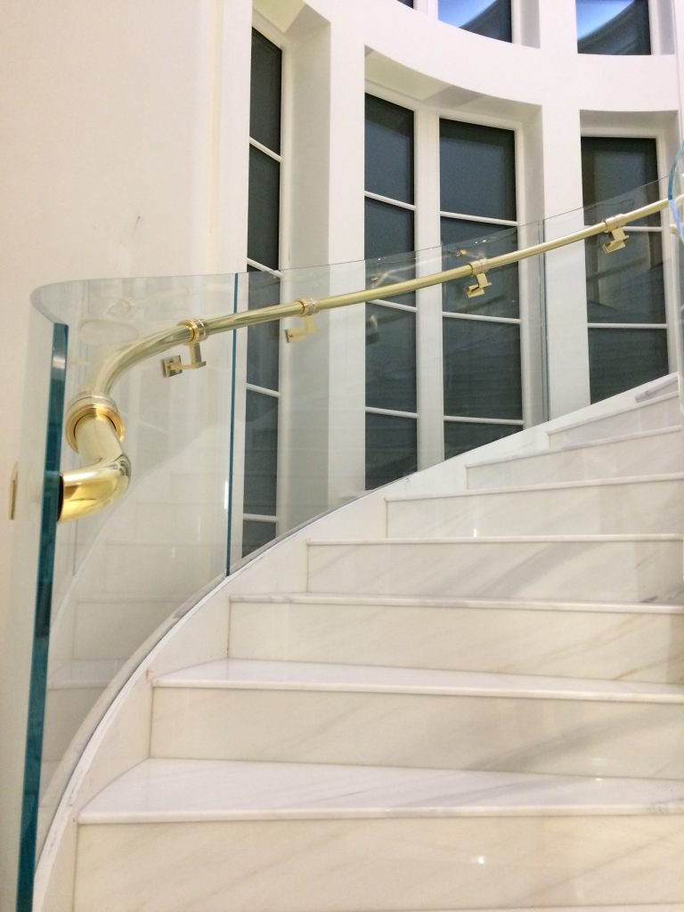 Brass Handrail on Glass Railing